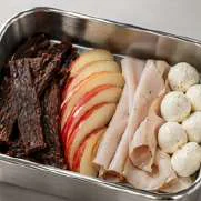 Snack box with apple, jerky and mozzarella